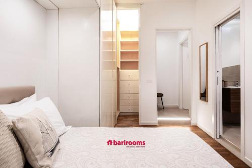 Postel nebo postele na pokoji v ubytování Barirooms - Crisanzio Suites