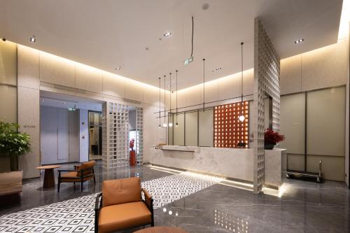 Istumisnurk majutusasutuses Liangzhi Huipin Hotel Haikou West Coast Yongwan Road Branch