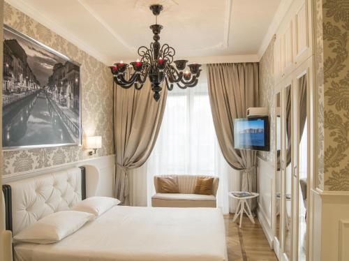 Posteľ alebo postele v izbe v ubytovaní Duomo Rooms