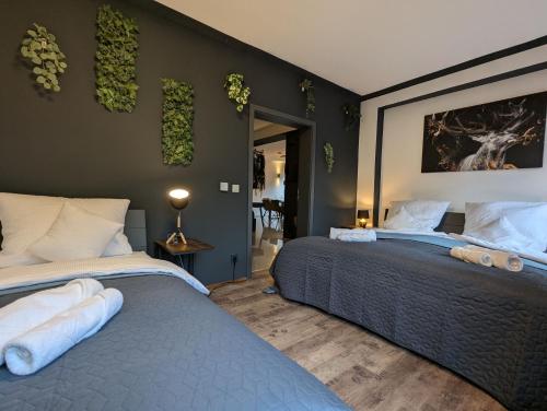 Ένα ή περισσότερα κρεβάτια σε δωμάτιο στο Ferienhaus "Die 16"