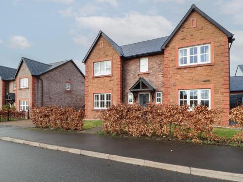 a row of brick houses on a street at 4 Centurion Rise in Penrith