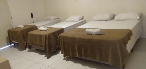 Ένα ή περισσότερα κρεβάτια σε δωμάτιο στο Hotel Prime Ceaka