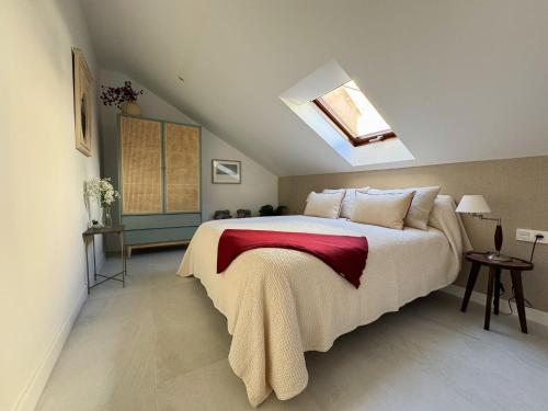 Ένα ή περισσότερα κρεβάτια σε δωμάτιο στο RYAP Isabel la Católica