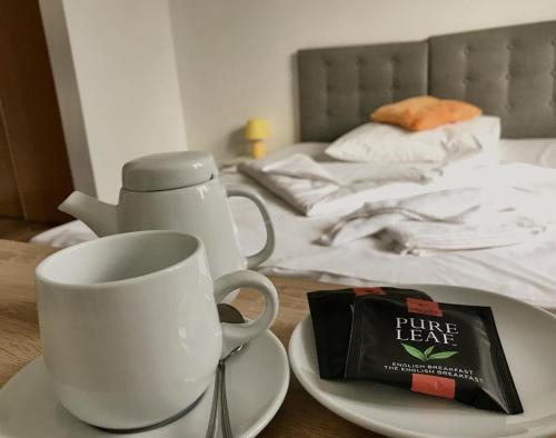 Postel nebo postele na pokoji v ubytování Hotel Miodowy
