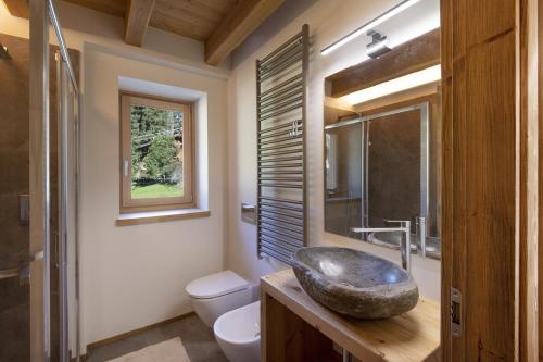 Koupelna v ubytování Chalet La Mia Baita 2