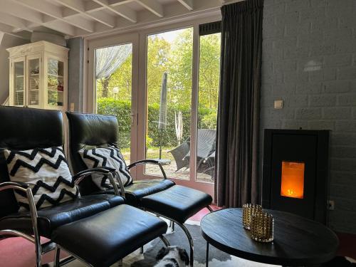Posezení v ubytování Natuurhuis 'Van De Wereld'