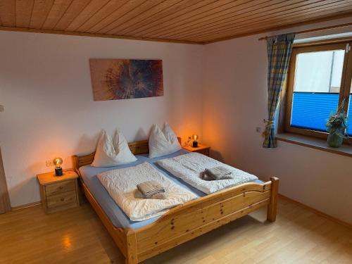 Postel nebo postele na pokoji v ubytování Gästehaus Posch