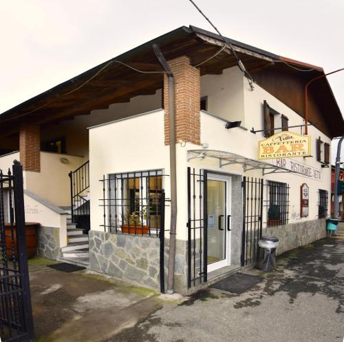 a building with a sign on the side of it at Appartamento Vetta Cremolino in Cremolino