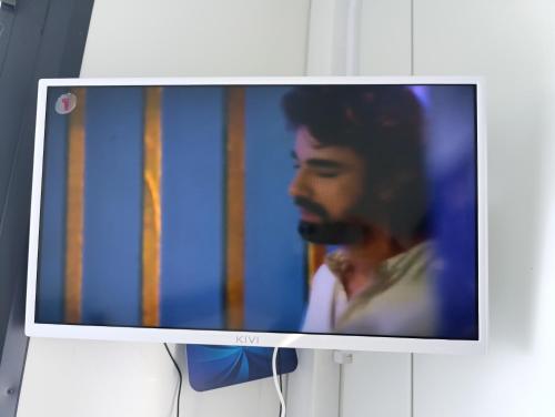 TV a/nebo společenská místnost v ubytování Pas Alksnius