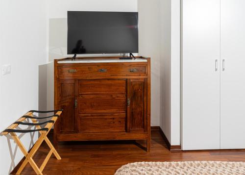 Uma televisão e/ou sistema de entretenimento em Casa Calé