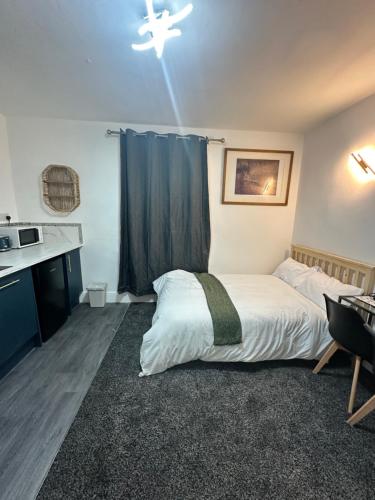 Ένα ή περισσότερα κρεβάτια σε δωμάτιο στο Room 7 NG3 2AZ