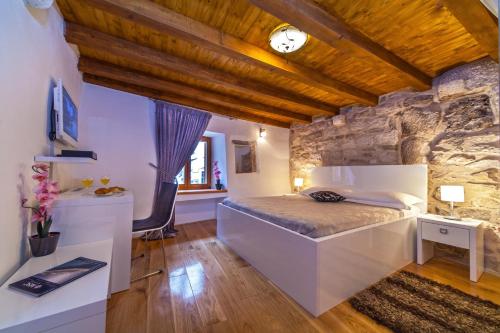 Letto o letti in una camera di Villa Split Heritage Hotel