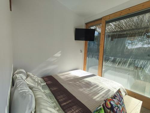 Postel nebo postele na pokoji v ubytování Aloe Residence Possidi