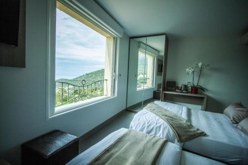 Ένα ή περισσότερα κρεβάτια σε δωμάτιο στο Hotel La Santa