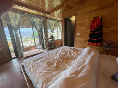 Postel nebo postele na pokoji v ubytování Muong Hoa - Sapa Retreat