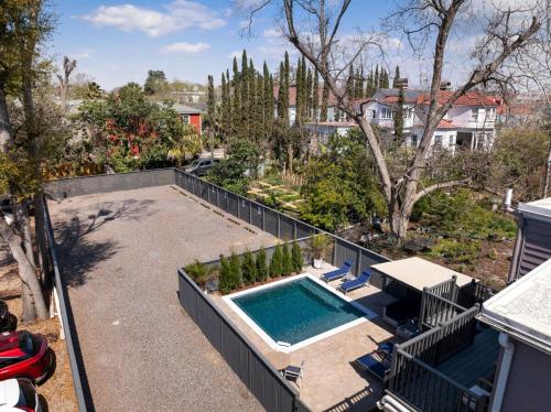 an aerial view of a backyard with a swimming pool at Private HEATED Pool Oasis 4 Bedroom Suite in Charleston