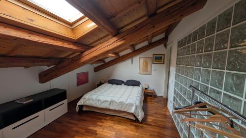 Ένα ή περισσότερα κρεβάτια σε δωμάτιο στο Piazza Grande Home