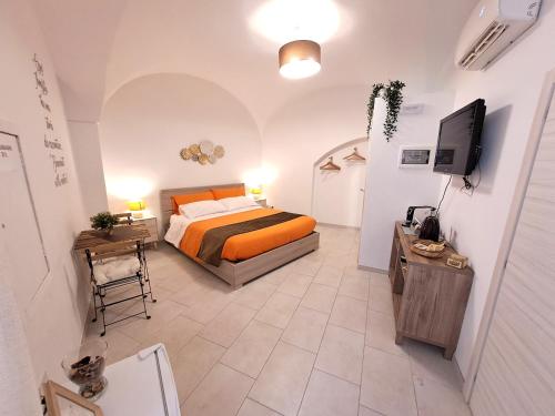 Postel nebo postele na pokoji v ubytování Il Vicolo b&b