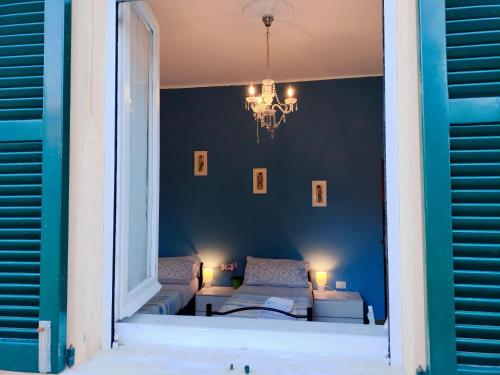 A bed or beds in a room at CASA MAFALDA - Rooms, friends and more - Affittacamere, Guest House