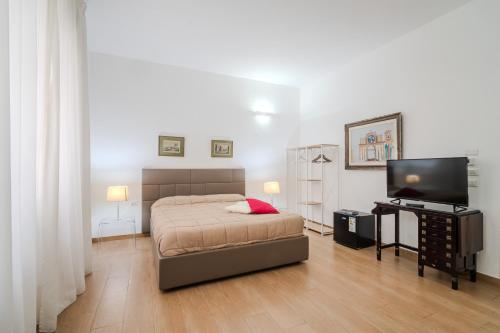 Postel nebo postele na pokoji v ubytování B&B Charme