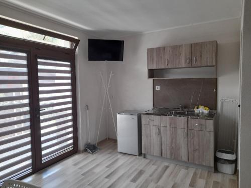 Dapur atau dapur kecil di Guest Rooms IDeR