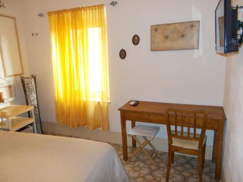 Ένα ή περισσότερα κρεβάτια σε δωμάτιο στο Guest House Le Arti Minori