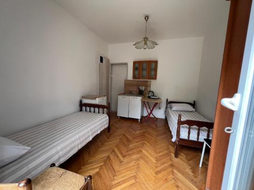 Postel nebo postele na pokoji v ubytování Green Villa