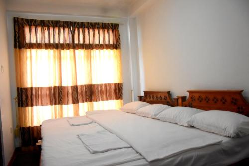 Katil atau katil-katil dalam bilik di The LaZORI GRAND VILLA