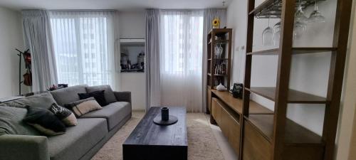 Posezení v ubytování River Cloud Apartment Shared
