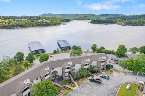 an aerial view of a house on the water at Moor Fun in Kimberling City