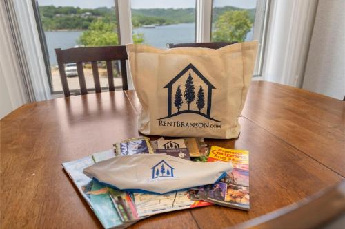 a bag sitting on top of a table with magazines at Moor Fun in Kimberling City