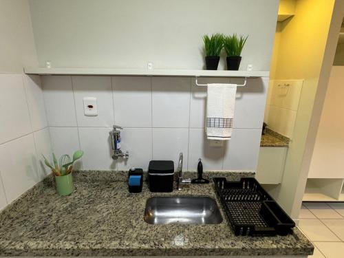 Η κουζίνα ή μικρή κουζίνα στο 906 Apartamento Gracioso!