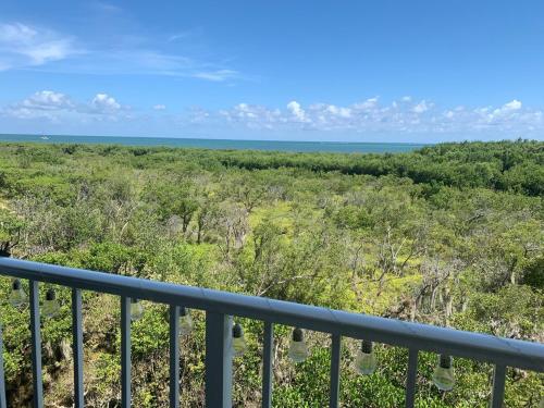 a view of the ocean from the balcony of a house at Ocean Pointe Resorts - Serenity 2308 in Tavernier