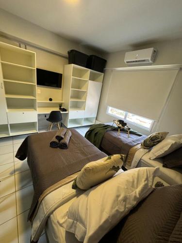 Ένα ή περισσότερα κρεβάτια σε δωμάτιο στο 906 Apartamento Gracioso!