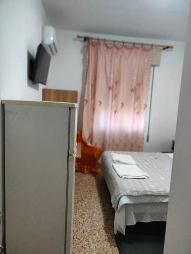 Postel nebo postele na pokoji v ubytování Bella cina