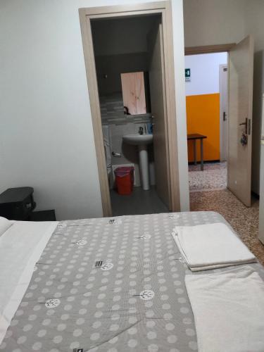 Postel nebo postele na pokoji v ubytování Bella cina
