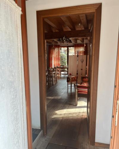an open door to a dining room with a table at Country Home B&B Il Melo in Vicenza
