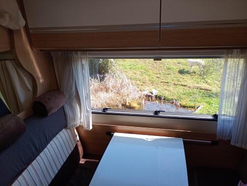 Posezení v ubytování Camping car au bord de l eau
