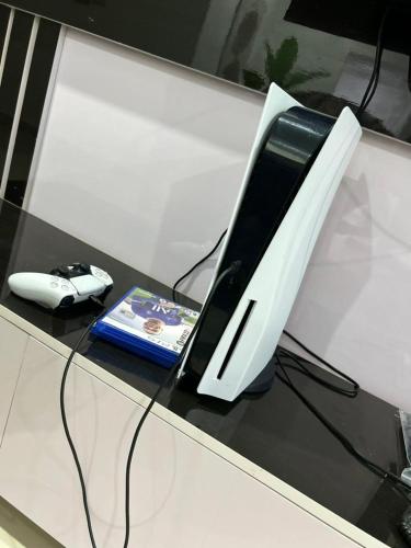 VIN-RUES Apartment and Suitesにあるテレビまたはエンターテインメントセンター