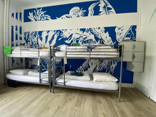 Ένα ή περισσότερα κρεβάτια σε δωμάτιο στο Kiez Hostel Berlin