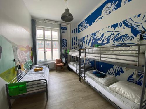 Postel nebo postele na pokoji v ubytování Kiez Hostel Berlin