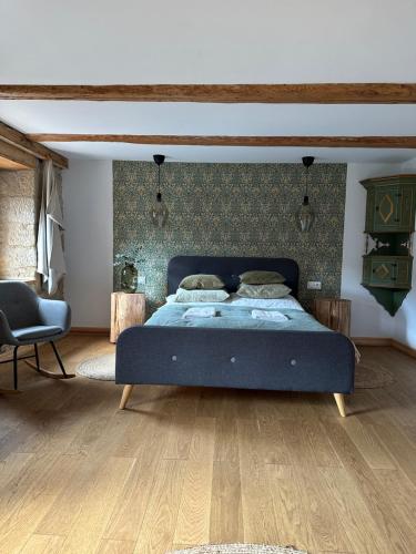 Postel nebo postele na pokoji v ubytování Dom Cukiernika