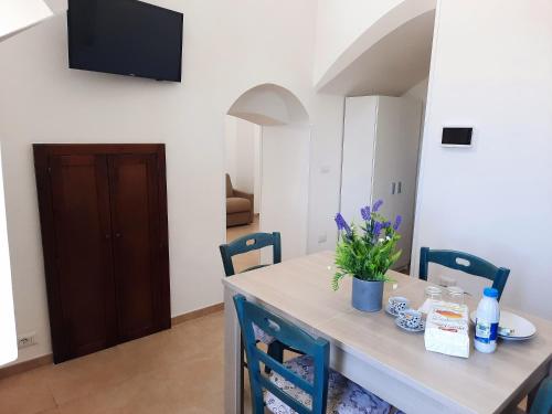TV a/nebo společenská místnost v ubytování Casa Porta Piazzella