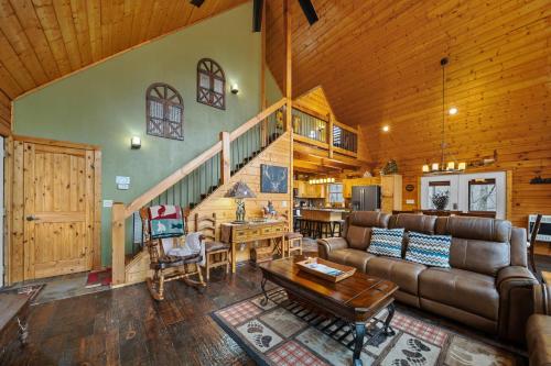 a living room with a couch and a table at Todd Escape in Todd