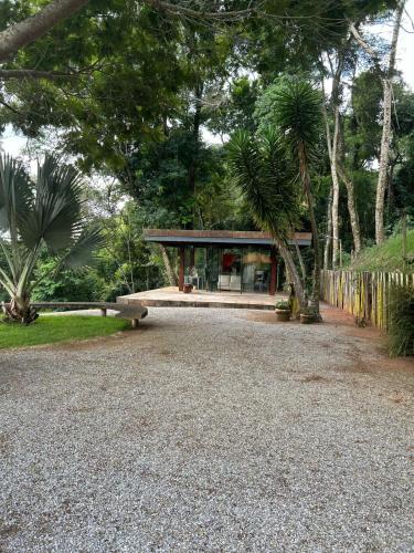 a house sitting on top of a gravel road at Casa de Montanha Quinta do Alto in Aiuruoca