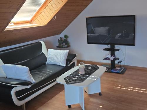 Una televisión o centro de entretenimiento en Holzfeld