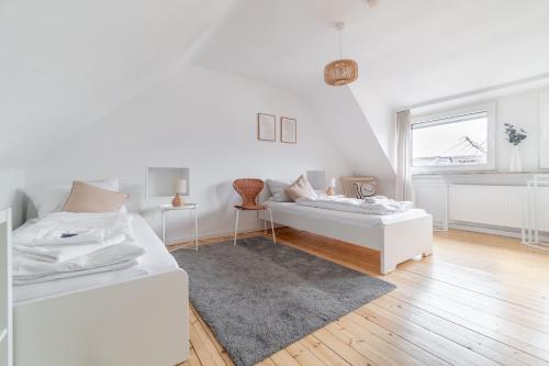 เตียงในห้องที่ Ganzes Haus - Stadtmitte - 5 Personen