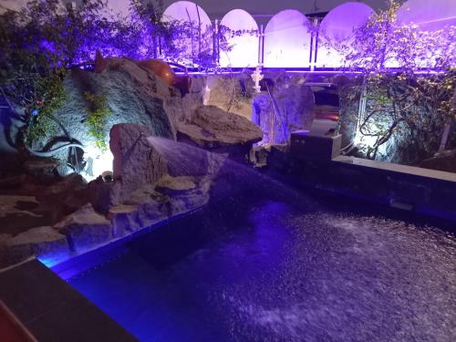 an overhead view of a river with rocks and lights at Air Luxury in Terzigno