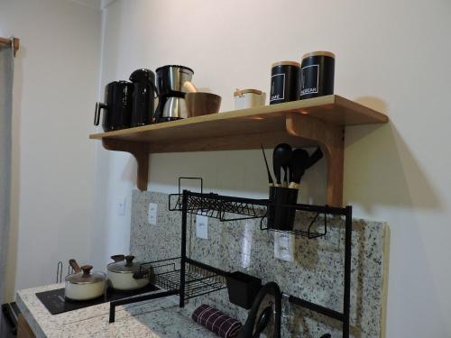 Η κουζίνα ή μικρή κουζίνα στο Residencial Mirante