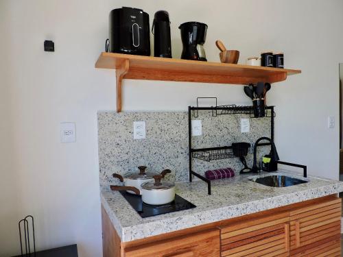 Η κουζίνα ή μικρή κουζίνα στο Residencial Mirante